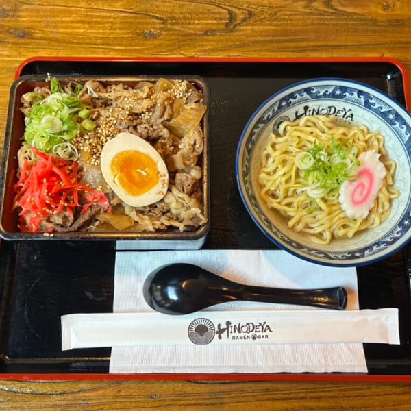 HINODEYA Ramen set with a bowl of ramen and a side of beef bowl with a soft-boiled egg.