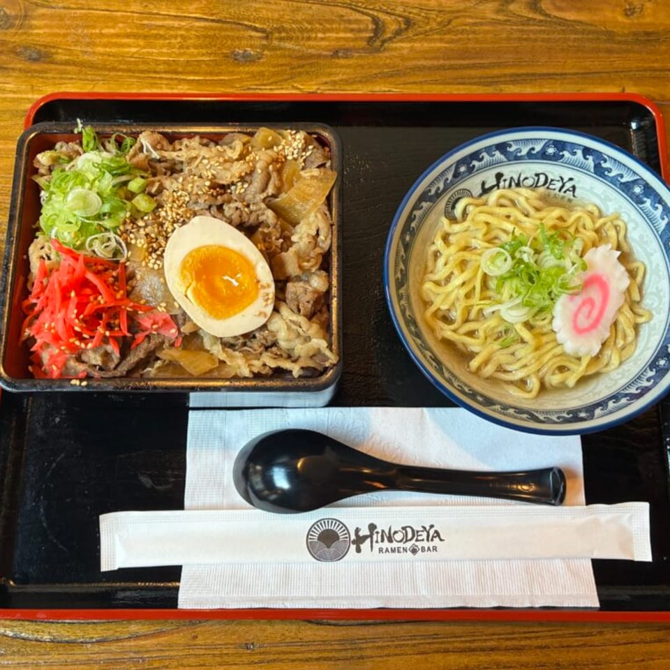 HINODEYA Ramen set with a bowl of ramen and a side of beef bowl with a soft-boiled egg.